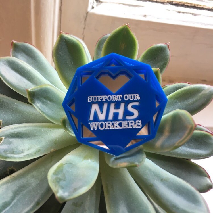 'Support our NHS workers' brooch