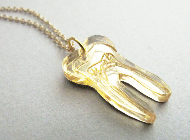 Gold Tooth Pendant