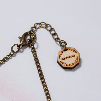 Caffeine molecule necklace