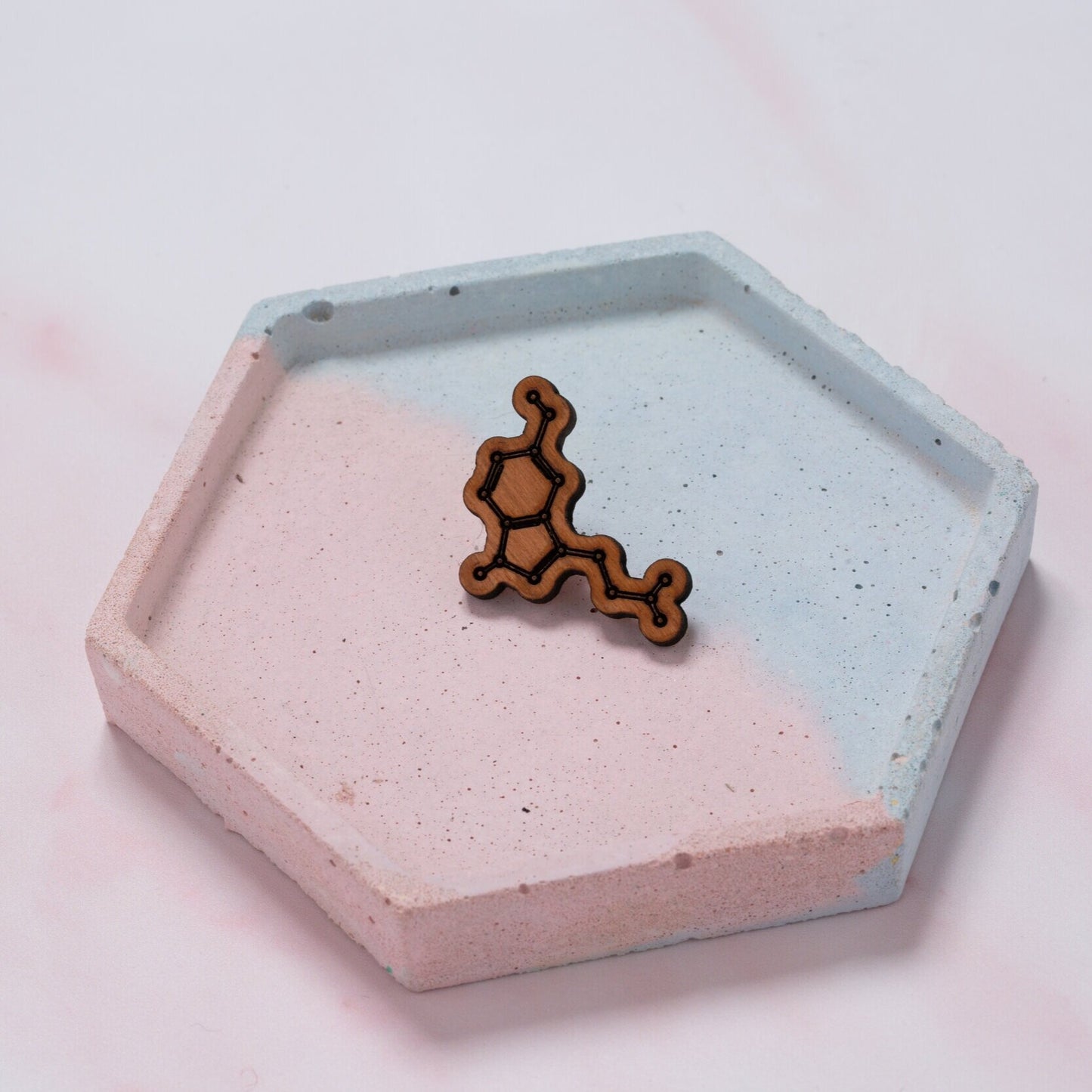Serotonin molecule pin badge: 'Happiness chemical'