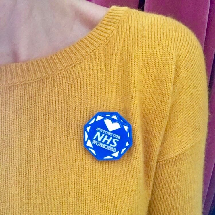 'Support our NHS workers' brooch