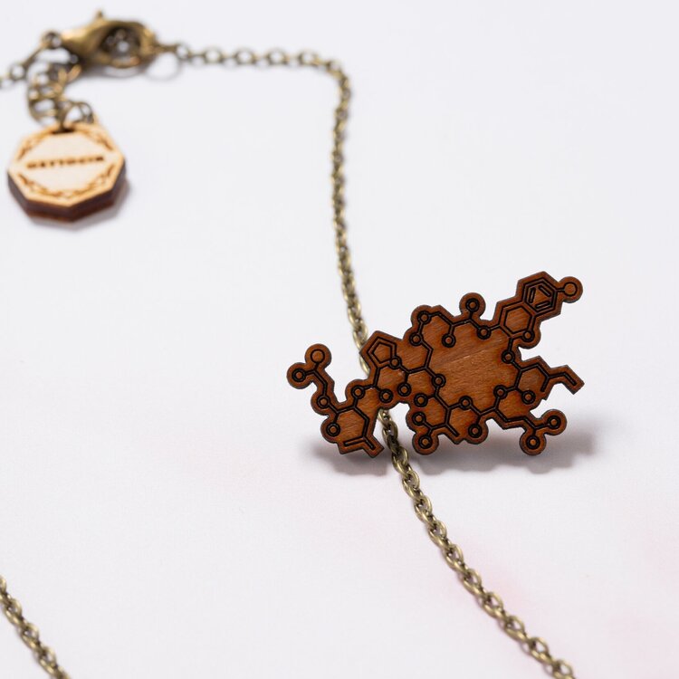 Oxytocin molecule pin: 'the love chemical'